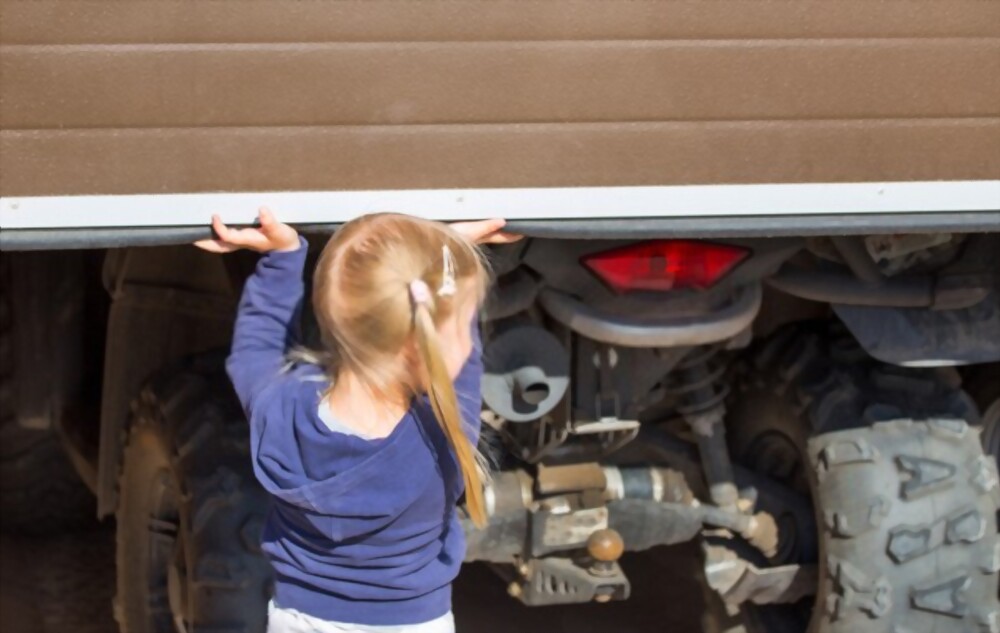 girl-opening-garage-door